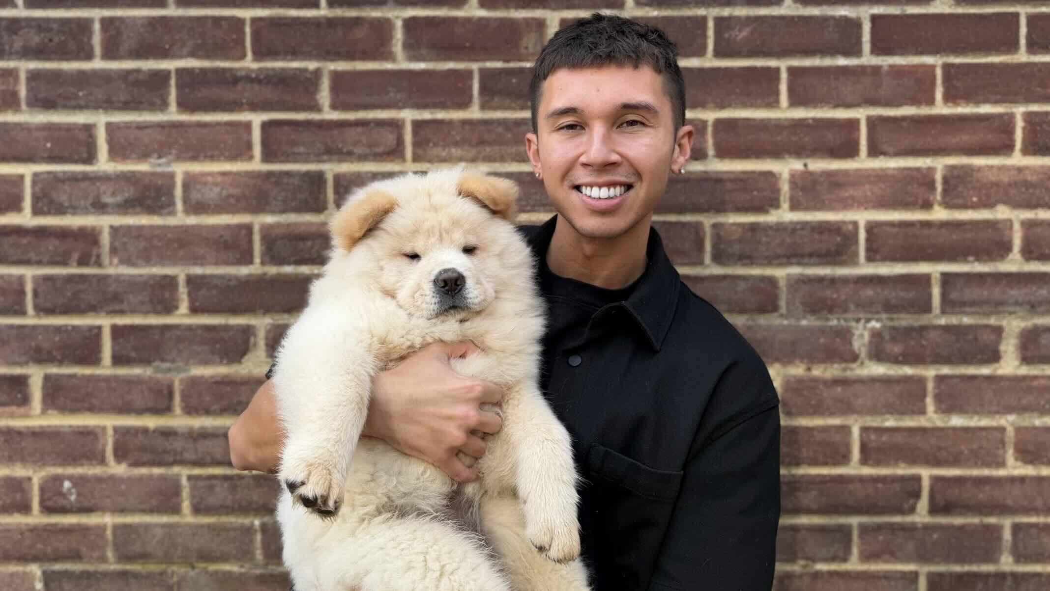 JJ Holland and brave fluffy rescue dog